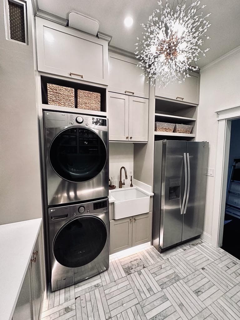 Tailored Laundry Cabinetry with Marble Surfaces